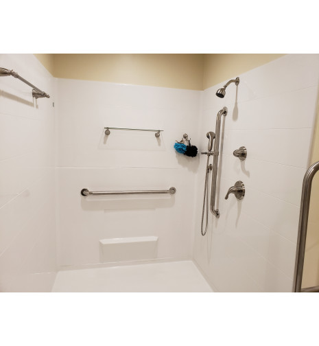 Installed large Freedom Shower with grab bars