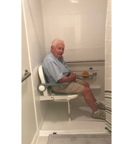 folding shower seat for senior in accessible shower
